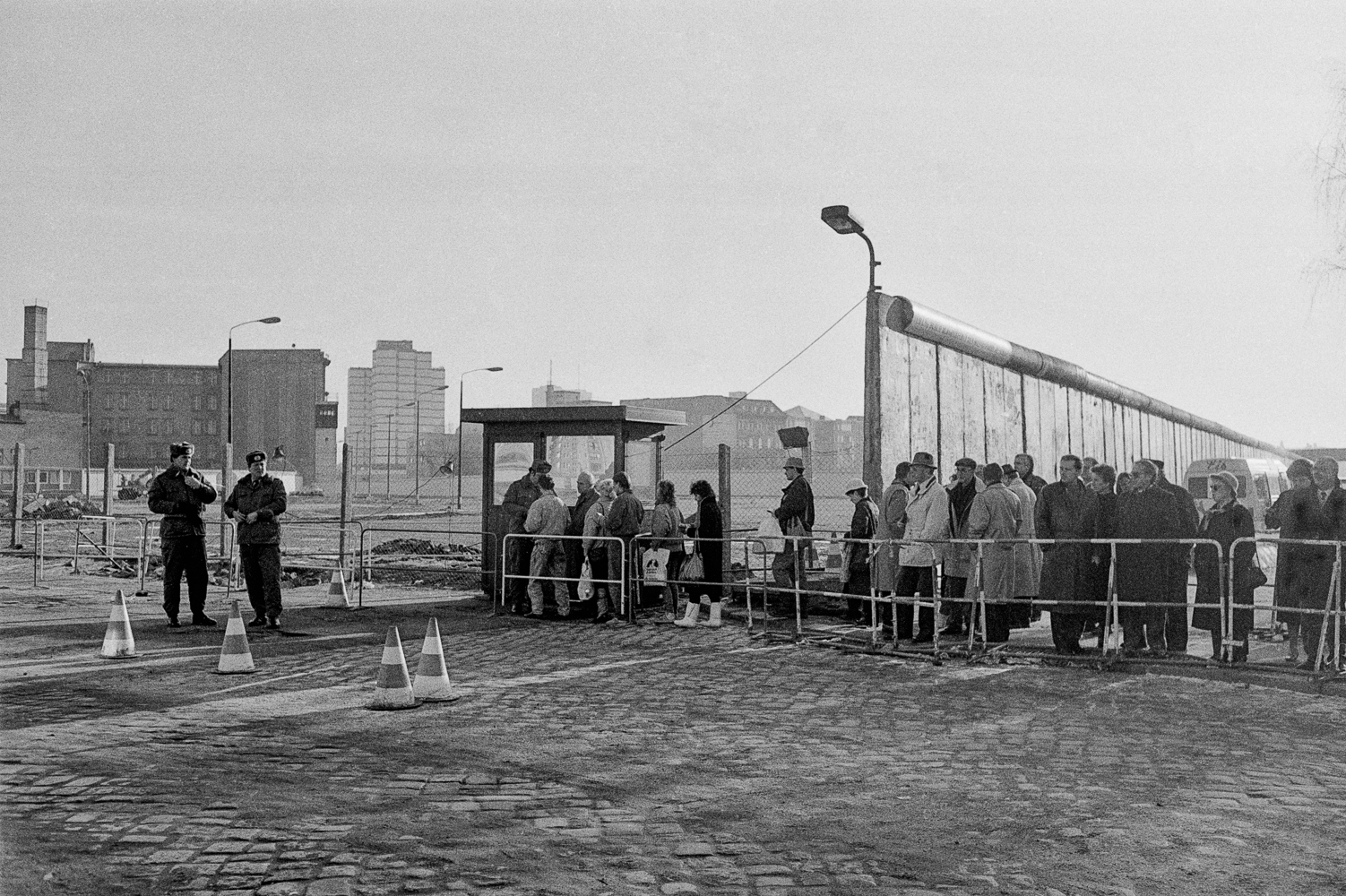 The Fall of the Berlin Wall. Esat Berliners queuing at an opening of the Berlin Wall in order to get back to East Berlin.